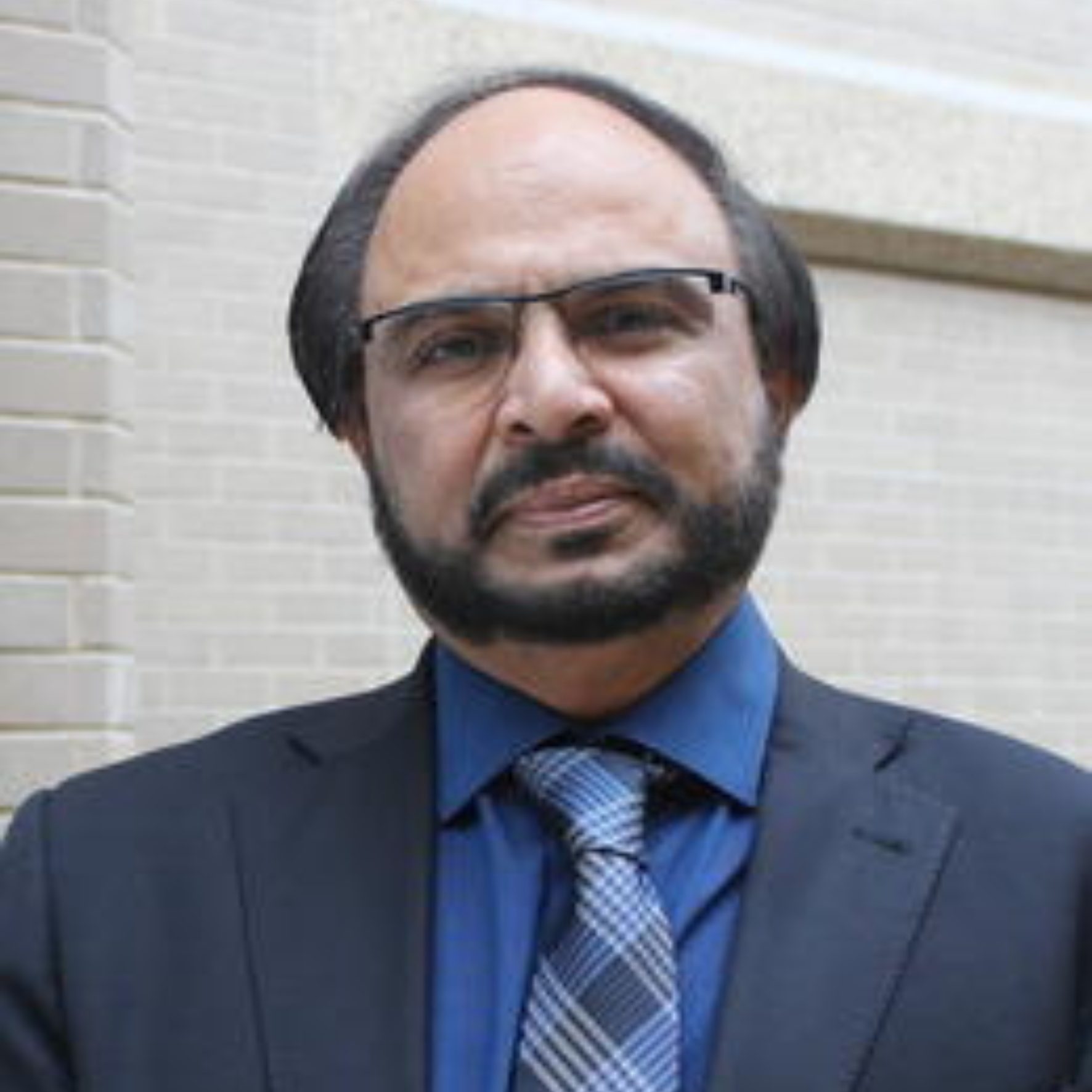 Dr. Naweed Syed